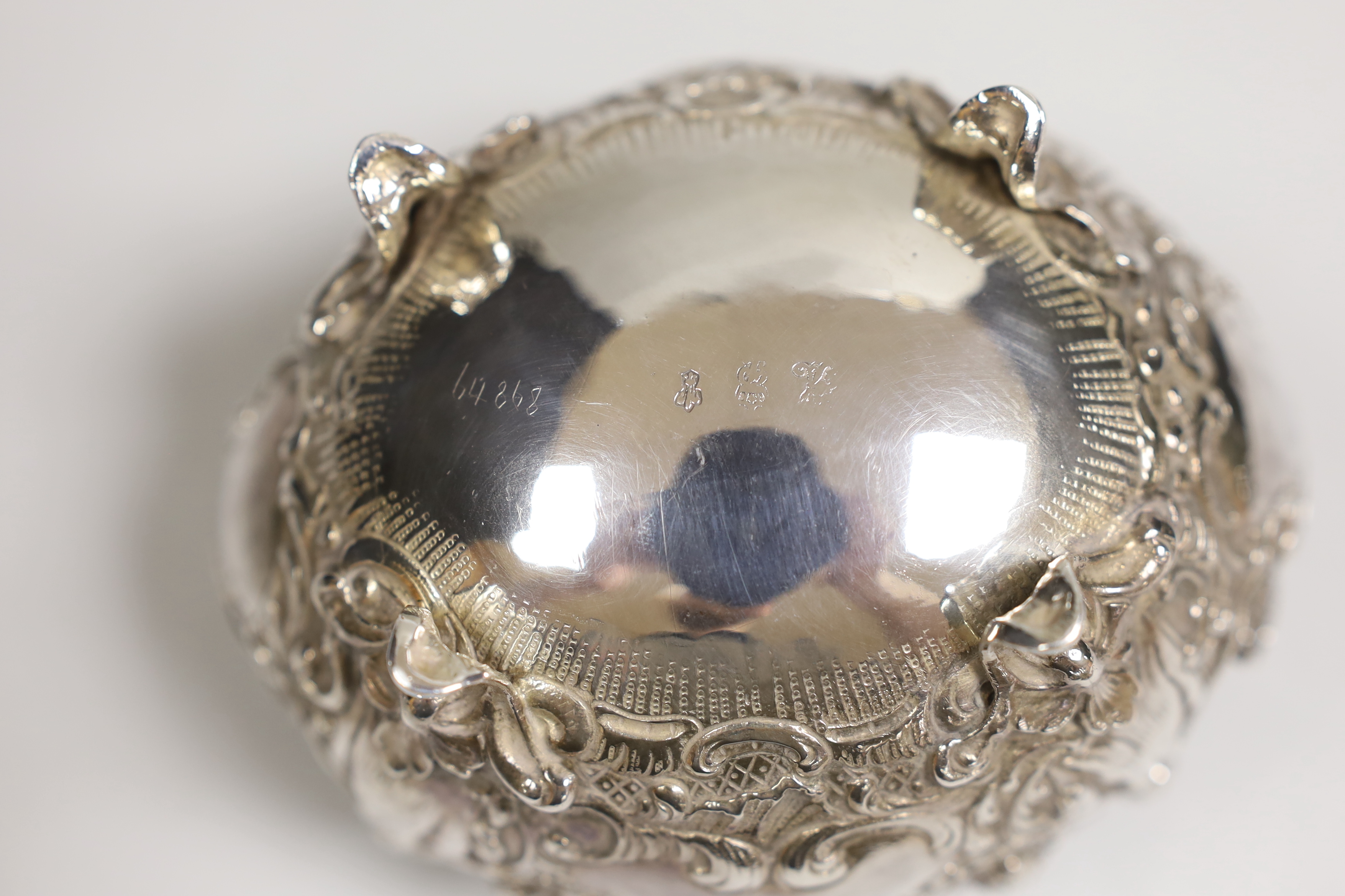 An early 20th century German embossed silver small oval bowl, import marks for Berthold Muller, London, 1903, length 12cm, 7.1oz.